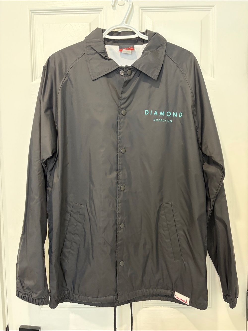 Diamond Supply Co. Black Coach Jacket with Teal Logo